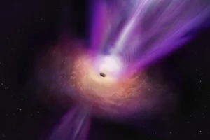 The black hole’s massive jet rising up from the center of the black hole.