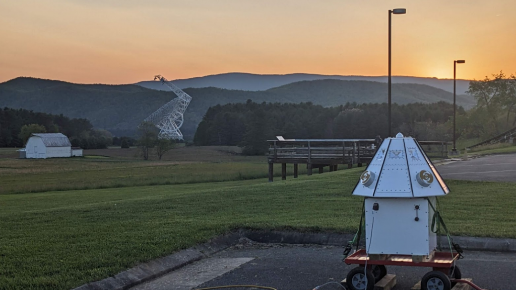 ASM-1 prototype on the Green Bank Observatory at sunset. The Green Bank Telescope stands in the background,