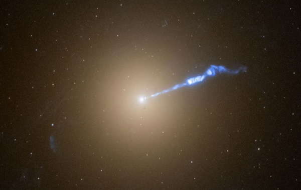 Blowtorch-like jet projecting out of the giant elliptical galaxy M87.